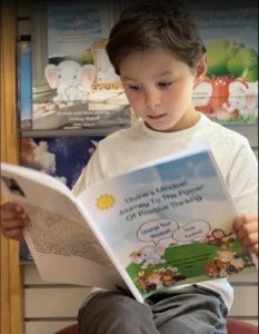 Kid focused on reading in bookstore