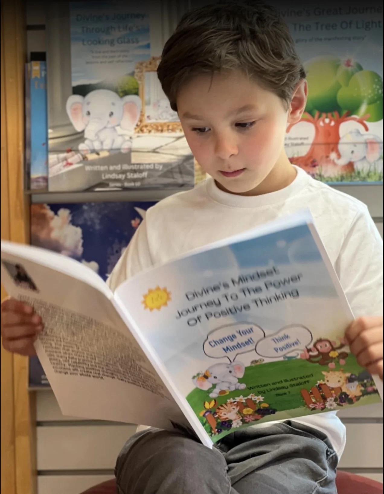 Kid focused on reading in bookstore